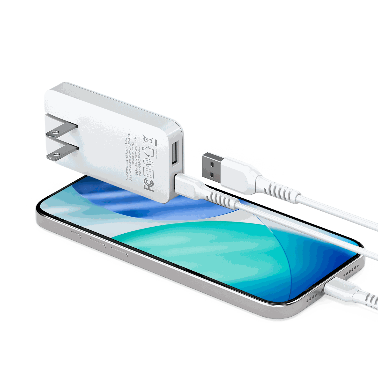 Lifestyle image showing the Motivecase 35W GaN charger setup with cables and a phone, ready to be used.