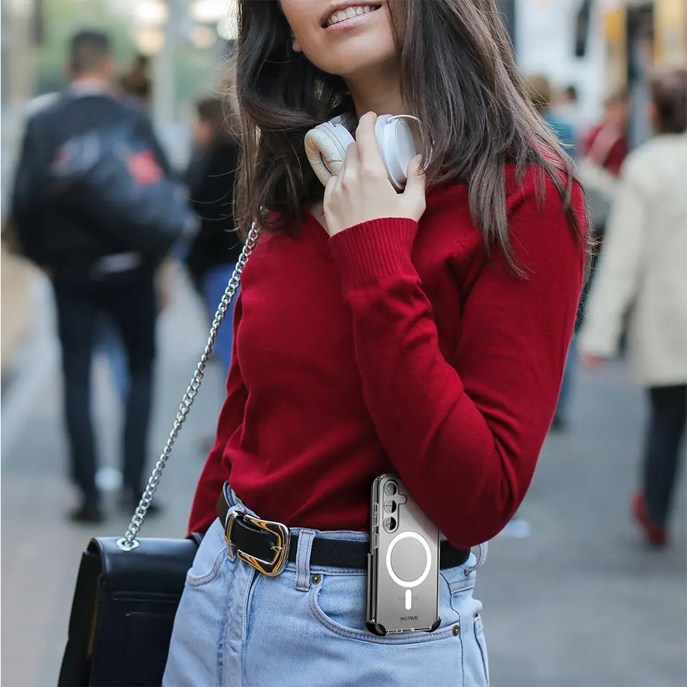 Galaxy S24 Clear Case & Holster on a woman wearing a red sweater and jeans.