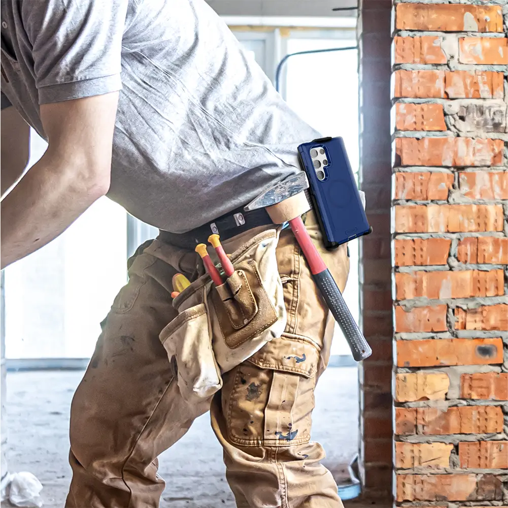 Galaxy S24 Ultra Case & Holster with belt clip, used by construction worker for heavy duty protection.