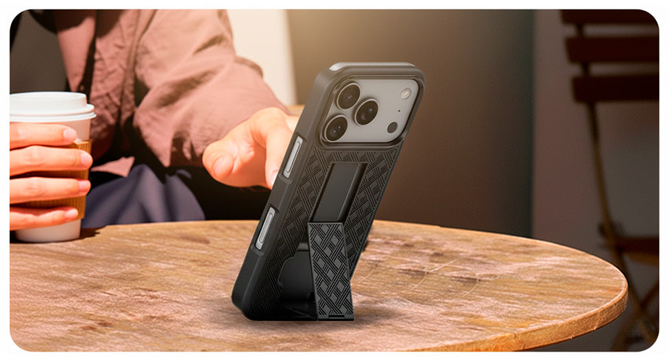 A man using the vertical kickstand on the Motivecase Ranger V1 case for a hands-free video call with an iPhone 17 on a wooden table.