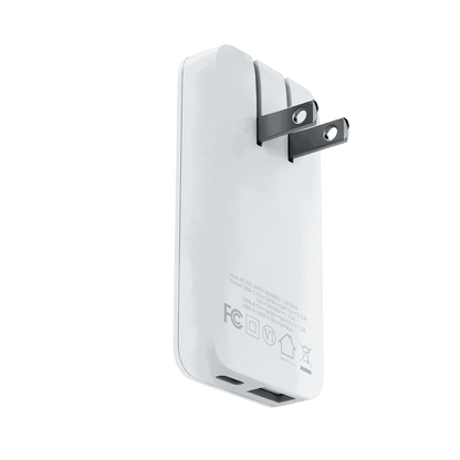 The Motivecase 35W GaN charger shown from the back, highlighting its folding prongs for travel portability.