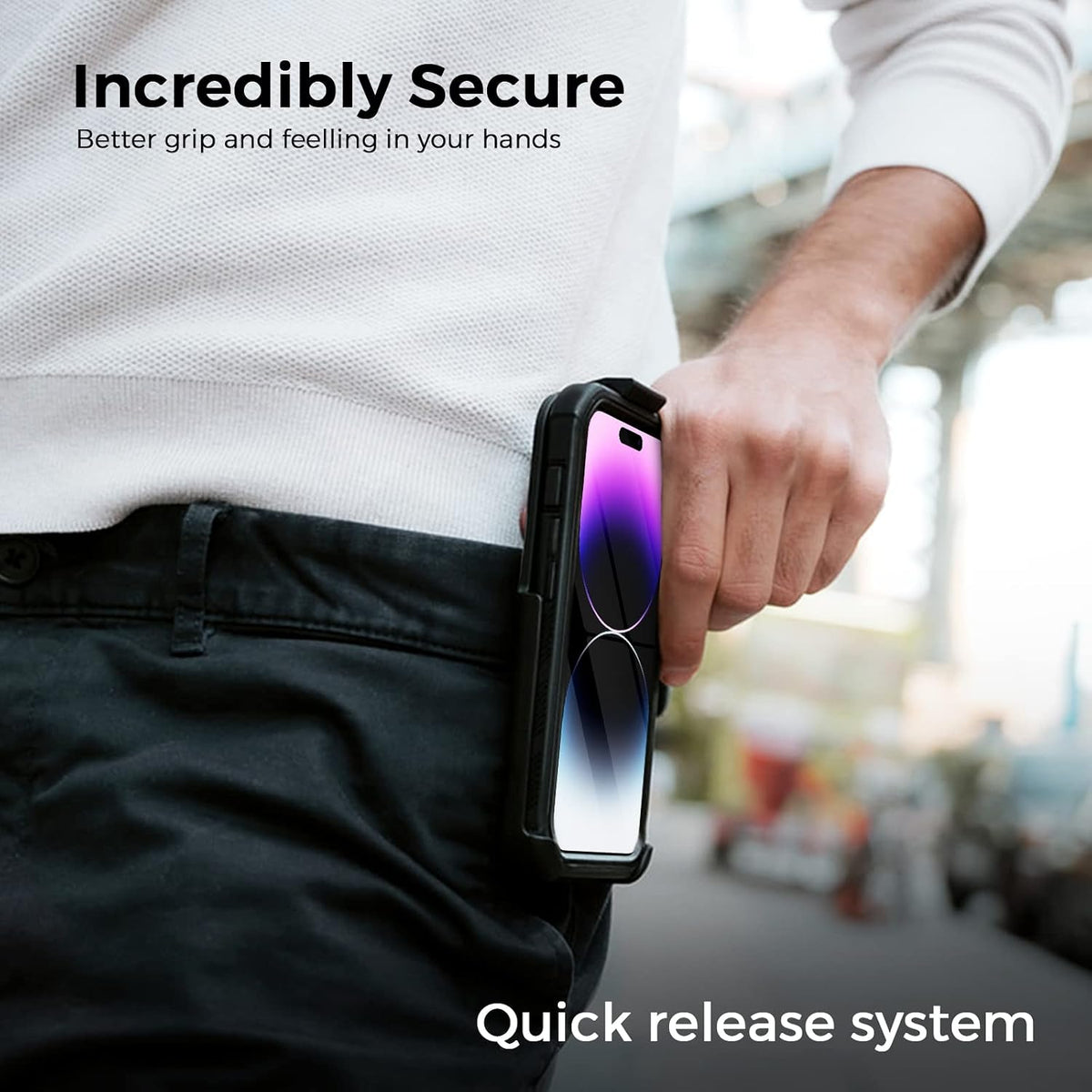 Person carrying Motivecase Bunker Series case for iPhone 14 Pro Max attached securely to waist belt with quick release holster clip mechanism.