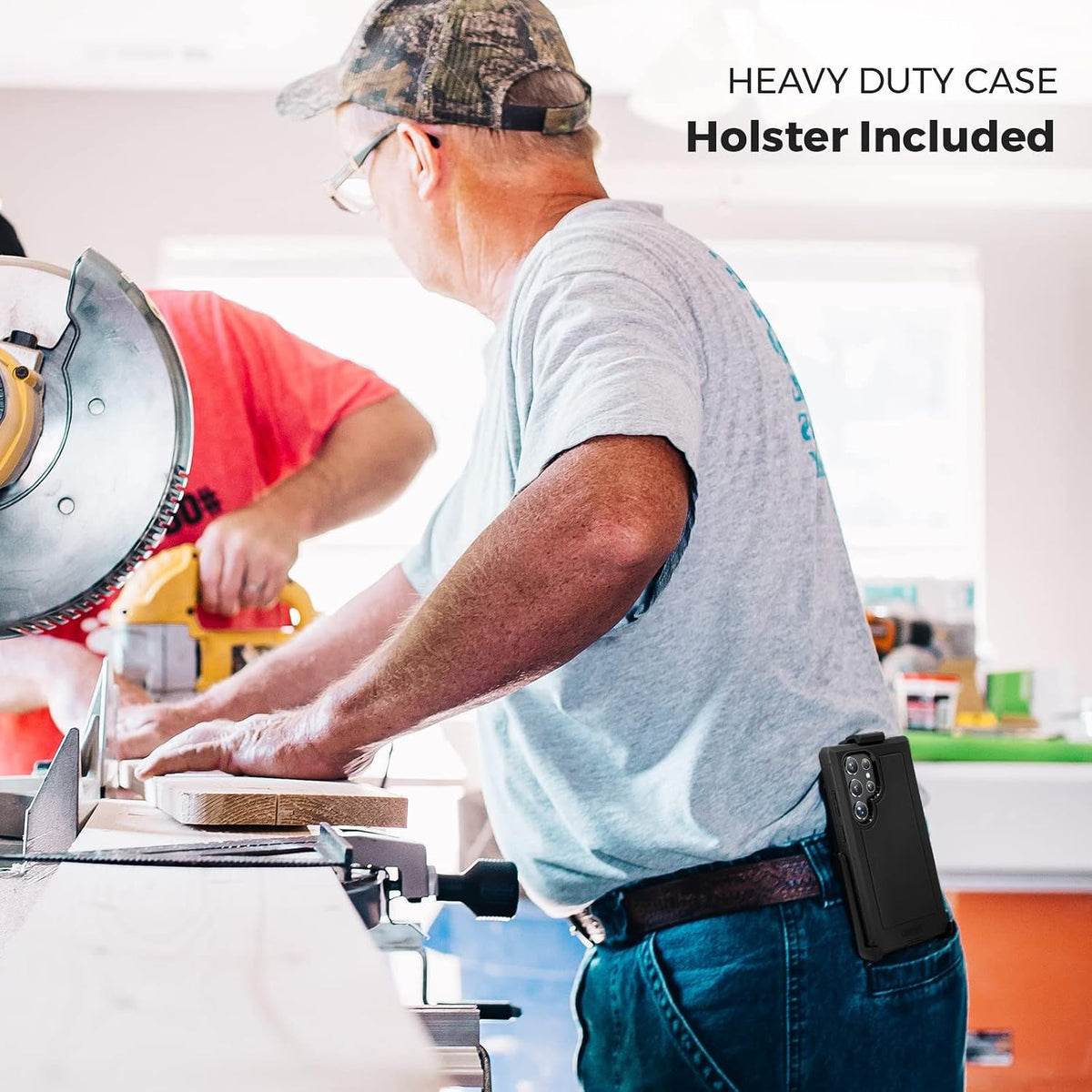 Woodworker at active job site wearing Motivecase Bunker heavy-duty case for Samsung Galaxy S22 Ultra attached securely to tool belt clip holster.