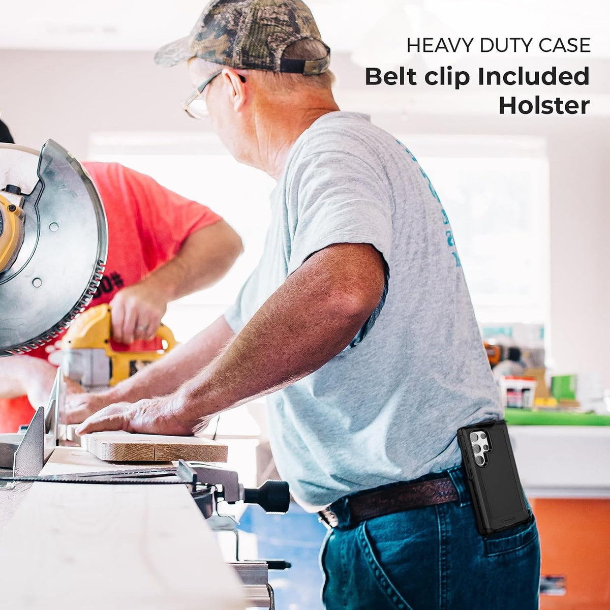 Woodworker at active job site wearing Motivecase Bunker heavy-duty case for Samsung Galaxy S23 Ultra attached securely to tool belt clip holster.